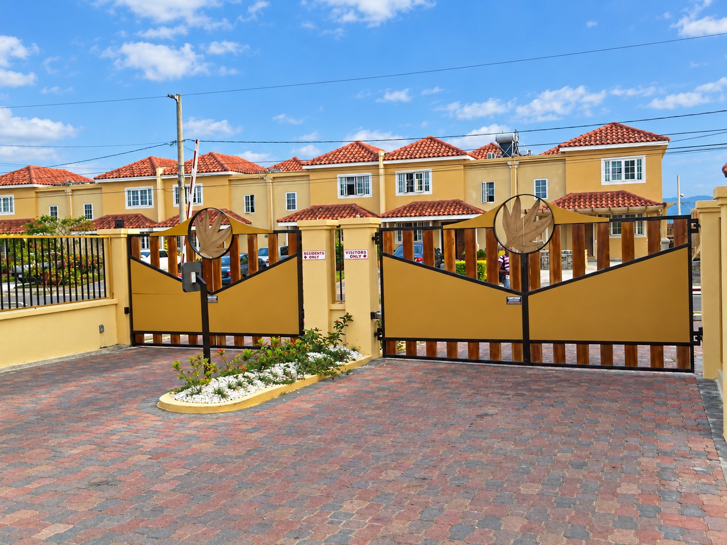 Entrance gates at Mango Walk Country Club