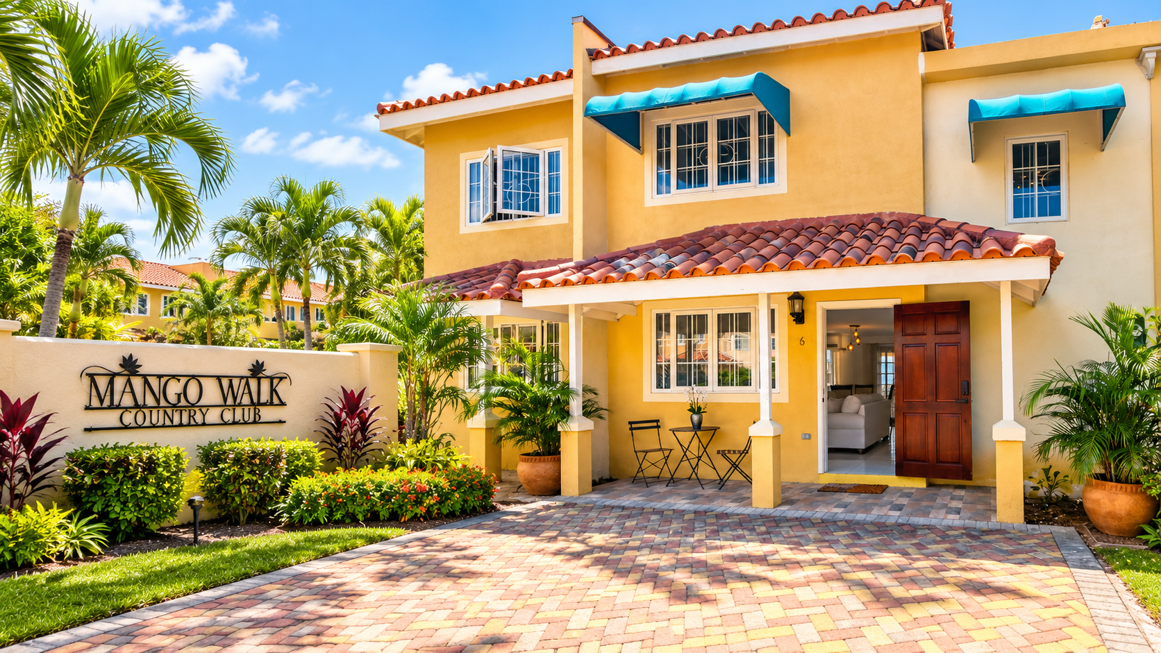 Mango Walk Country Club townhome and entrance sign